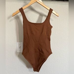 Elegant Brown Ribbed Bodysuit